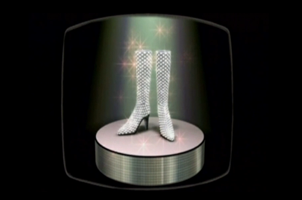 Knee high boots covered in diamonds